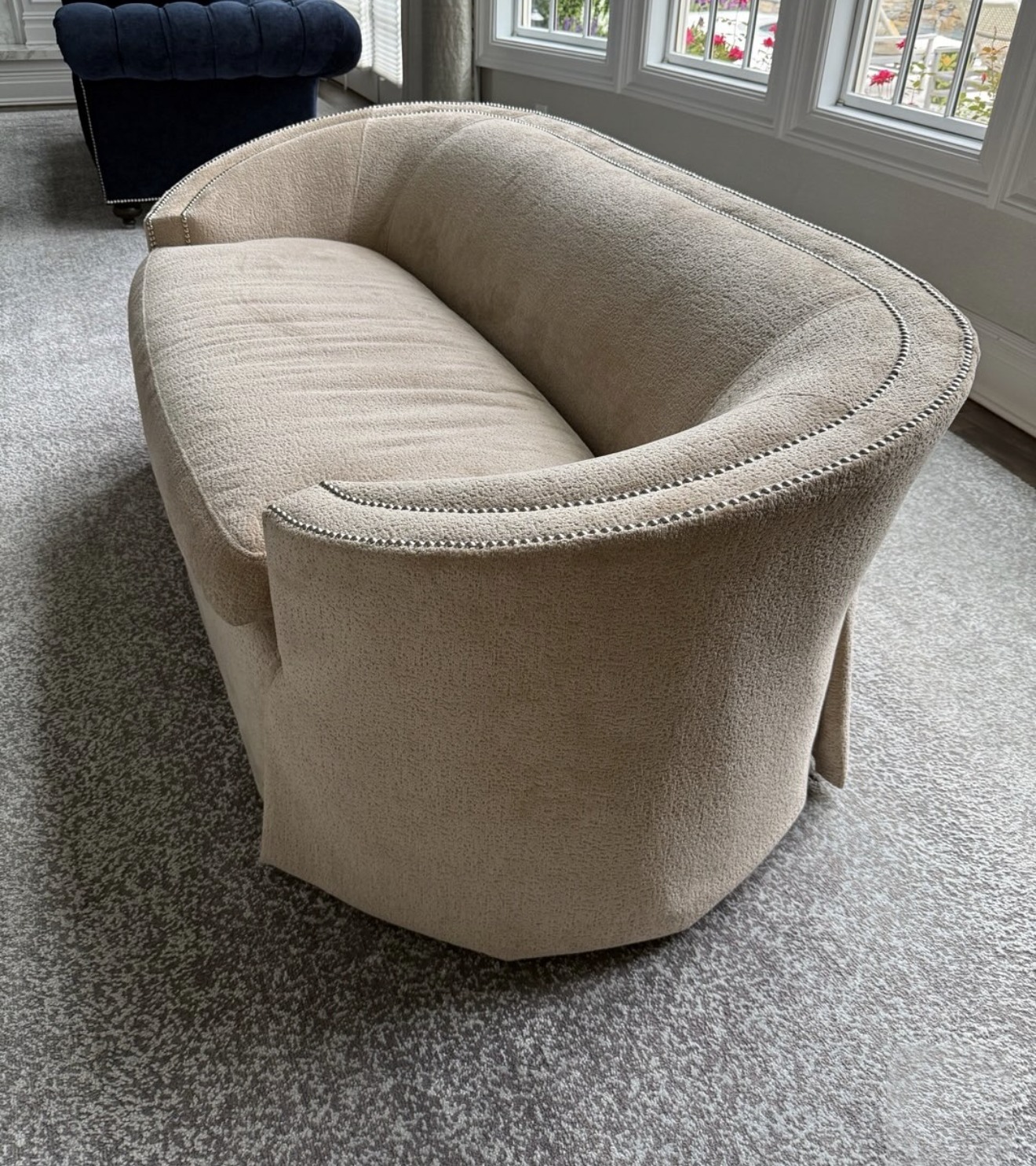 Curved boucle demilune sofa in camel