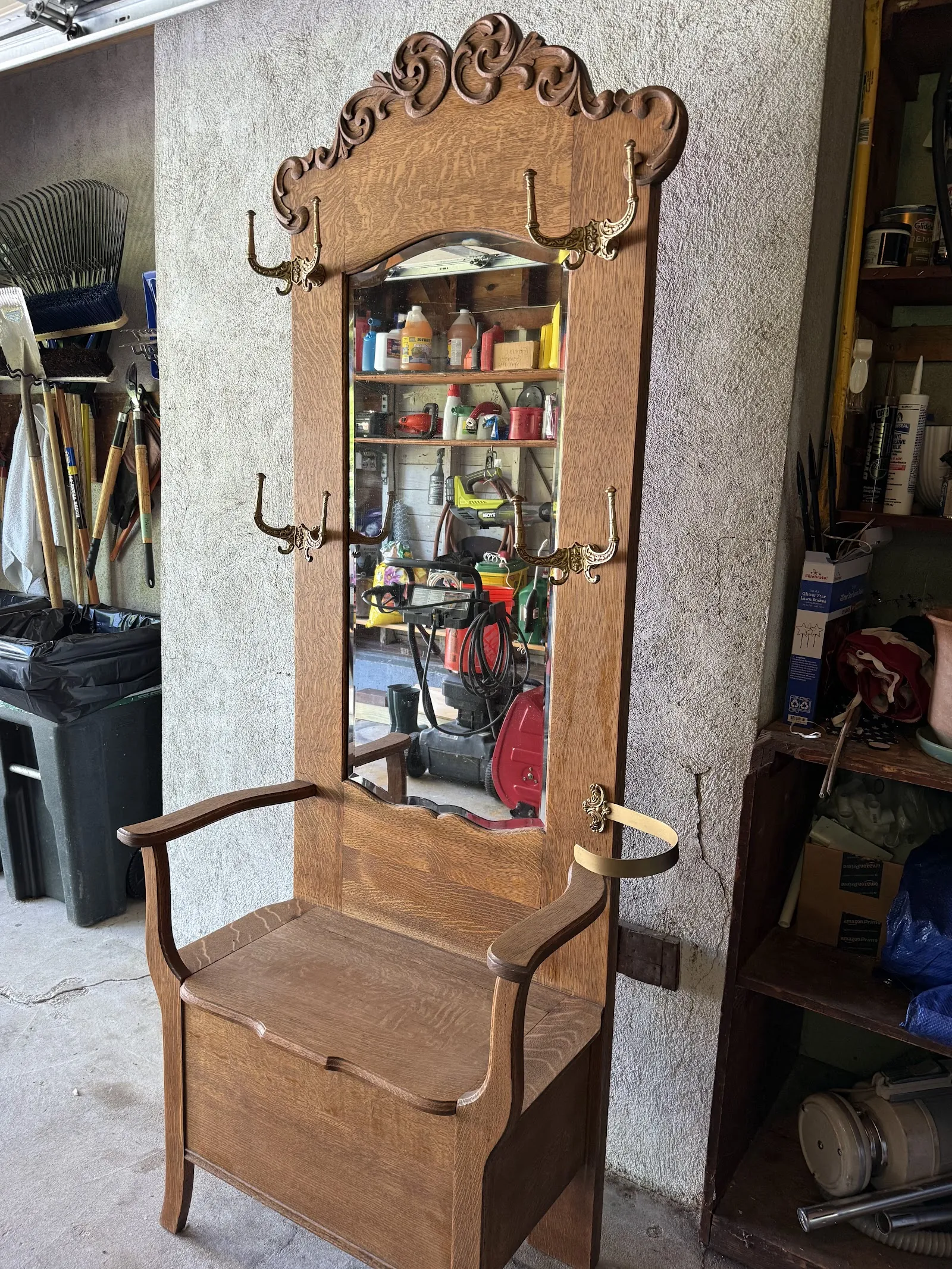 Antique wood hall tree with mirror and storage bench