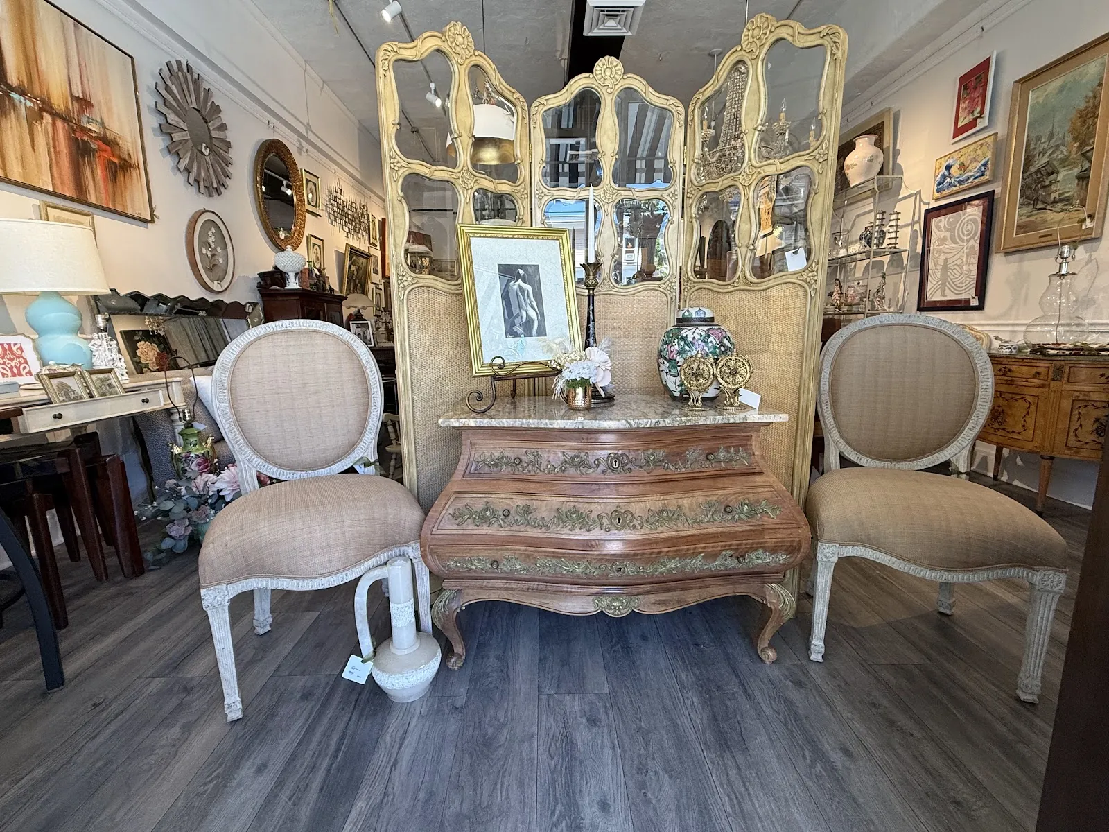 Shop interior with mirrored table and chairs