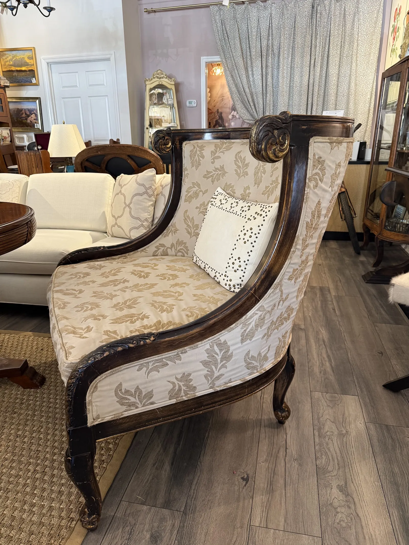 Upholstered bench with floral pattern fabric